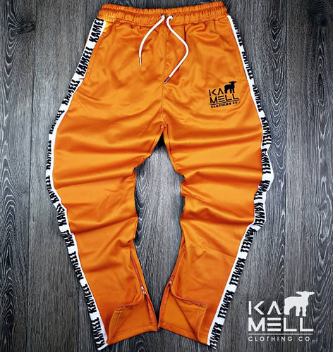 KAMELL ORANGE TRACK PANTS