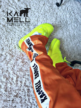 KAMELL ORANGE TRACK PANTS