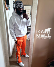 KAMELL ORANGE TRACK PANTS